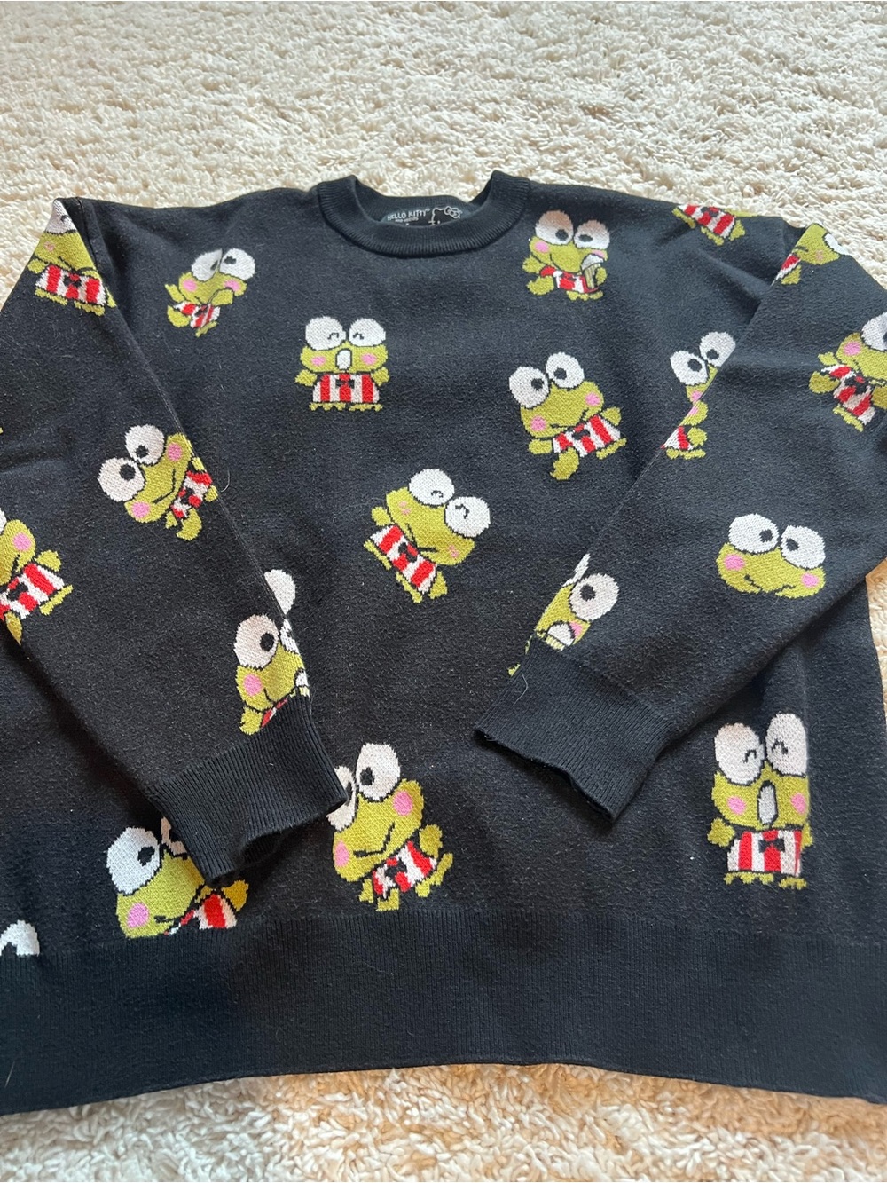 Hello Kitty Black Sweater with Green Frog and Red Accents